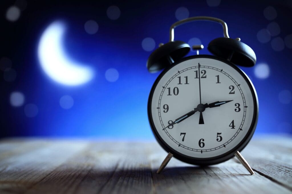 Sleep problems of older adults as depicted with a clock and moon background